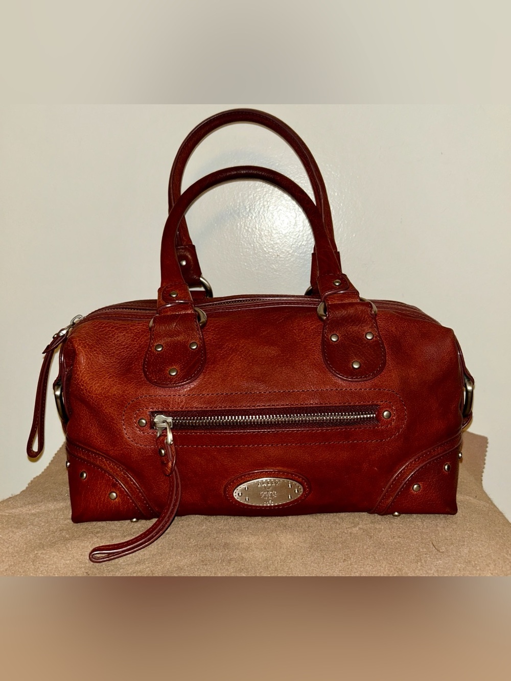 Bally bordeaux red leather doctor-style satchel handbag.